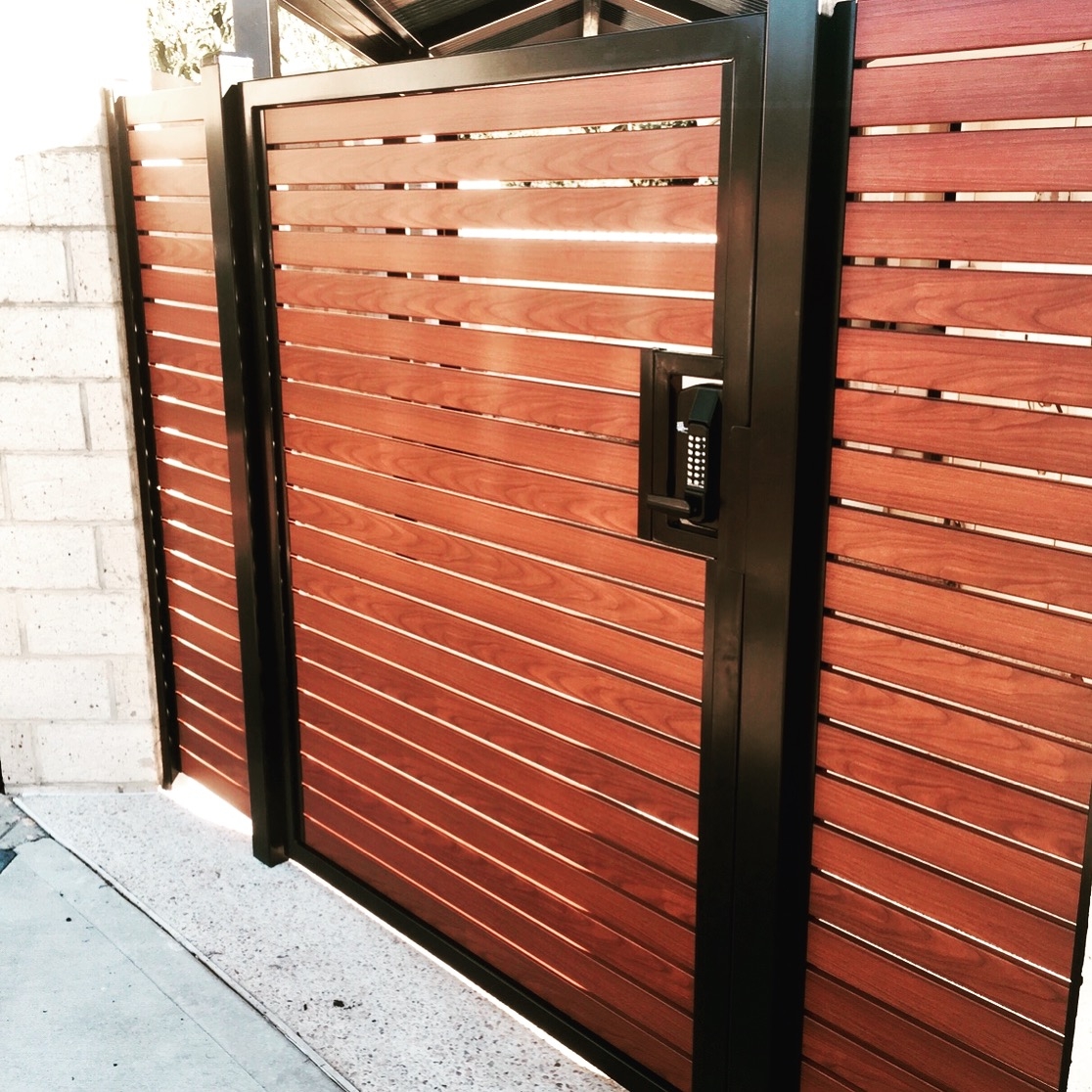 Pedestrian gate paired with driveway gate in San Anselmo
