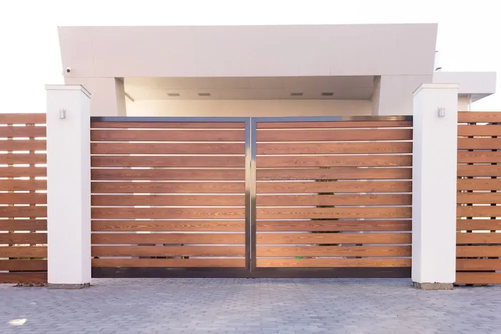 Wood-clad driveway gate installation in San Rafael CA